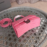 Handle and strap detail of structured classic women's handbag – women's luxury handbag