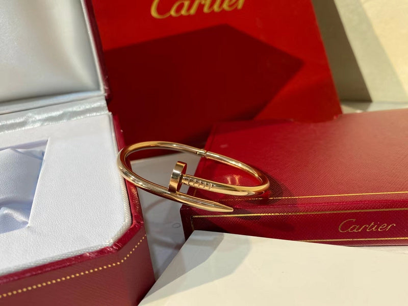Close-up detail view of Cartier unisex jewelry piece