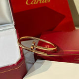Close-up detail view of Cartier unisex jewelry piece