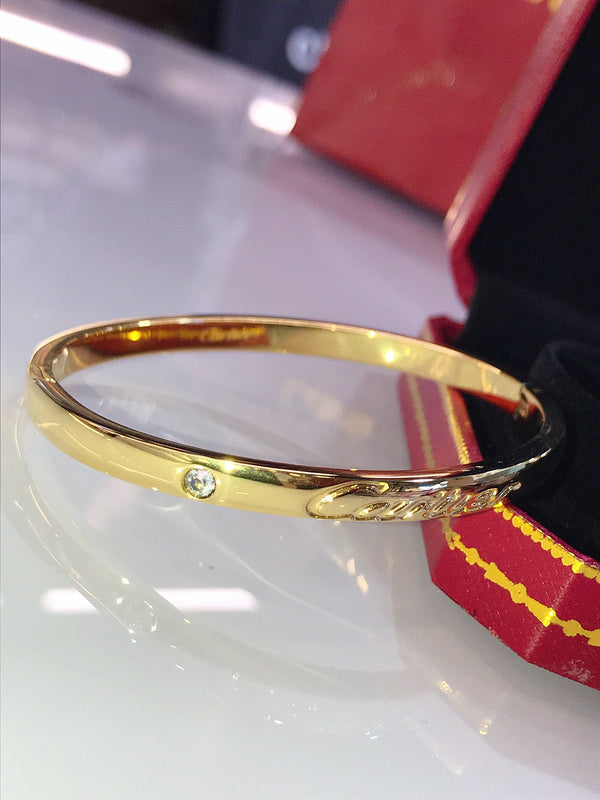 Angled view of Cartier unisex jewelry piece