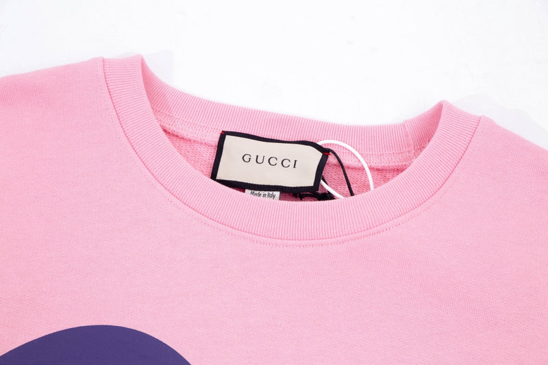 Close-up detail shot of Gucci luxury clothing with relaxed-fit cut