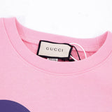 Close-up detail shot of Gucci luxury clothing with relaxed-fit cut