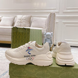 Gucci classic monochrome luxury sneakers view 7 retro runner design