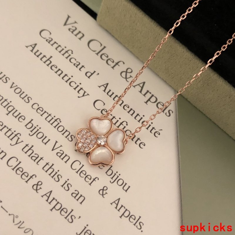 Lifestyle view of Van Cleef & Arpels unisex jewelry piece