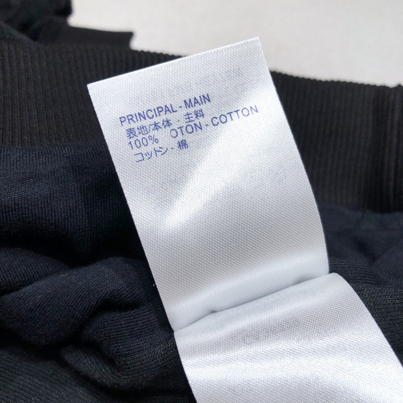 Close-up detail shot of Louis Vuitton luxury clothing with contemporary cut