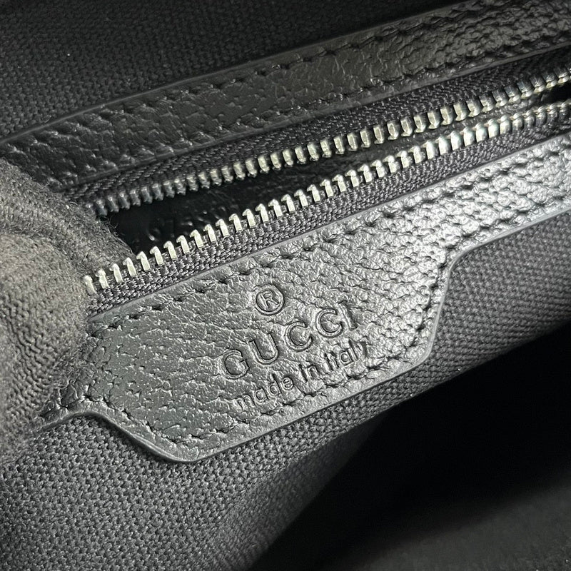 Close-up detail of everyday-luxe statement women's handbag – women's luxury handbag