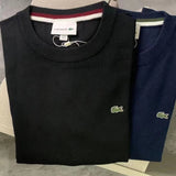 Back view of Lacoste luxury clothing with monogram-inspired silhouette