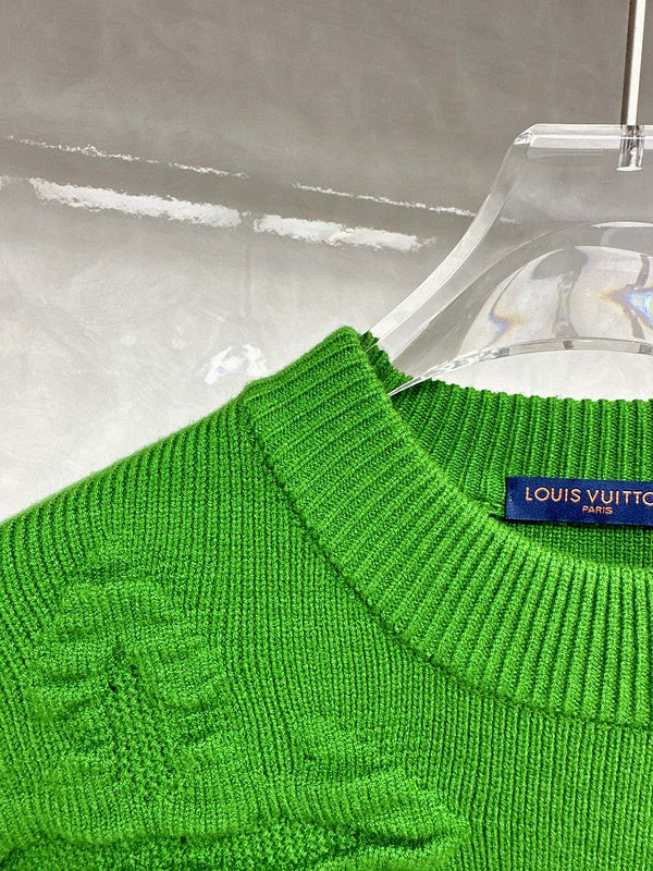 Close-up detail shot of Louis Vuitton luxury clothing with relaxed-fit cut