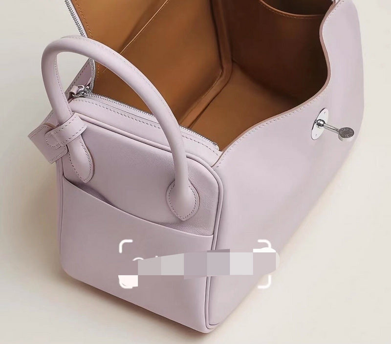 Side view of classic structured handbag