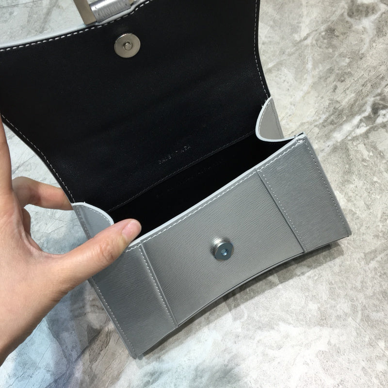 Understated Vegan Leather Handbag - Statement Silhouette | Women's Everyday Carry Handbag #613 - styled full view (image 7) of designer-inspired handbag