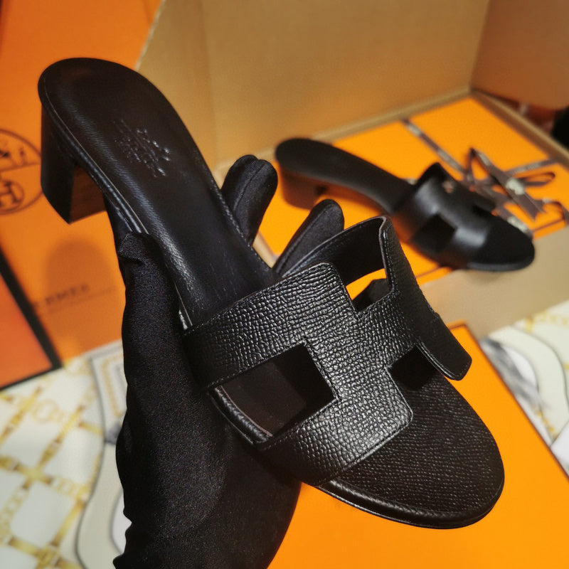 Hermès Black Slide Sandals - Side Profile View