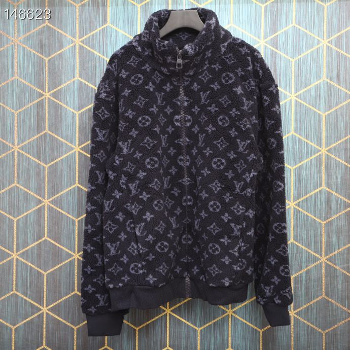 Close-up detail shot of Louis Vuitton luxury clothing with tailored silhouette