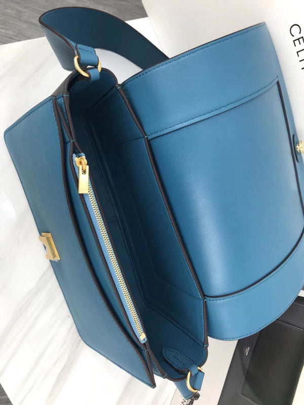 Handle and strap detail of chic structured women's handbag – women's designer-style accessory
