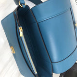 Handle and strap detail of chic structured women's handbag – women's designer-style accessory