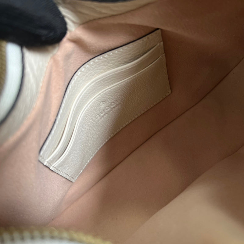 Close-up detail of sleek structured women's handbag – women's statement bag