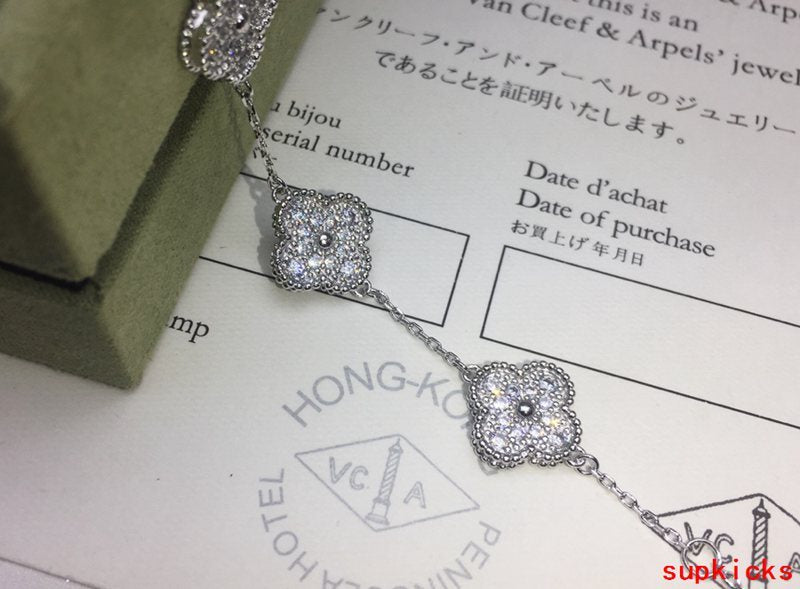 Lifestyle view of Van Cleef & Arpels unisex jewelry piece