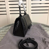 Styled lifestyle shot of premium sleek women's handbag – women's everyday handbag