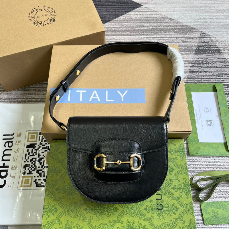 Side profile of elevated statement women's handbag – women's luxury accessory