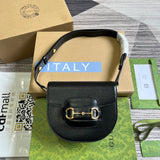 Side profile of elevated statement women's handbag – women's luxury accessory