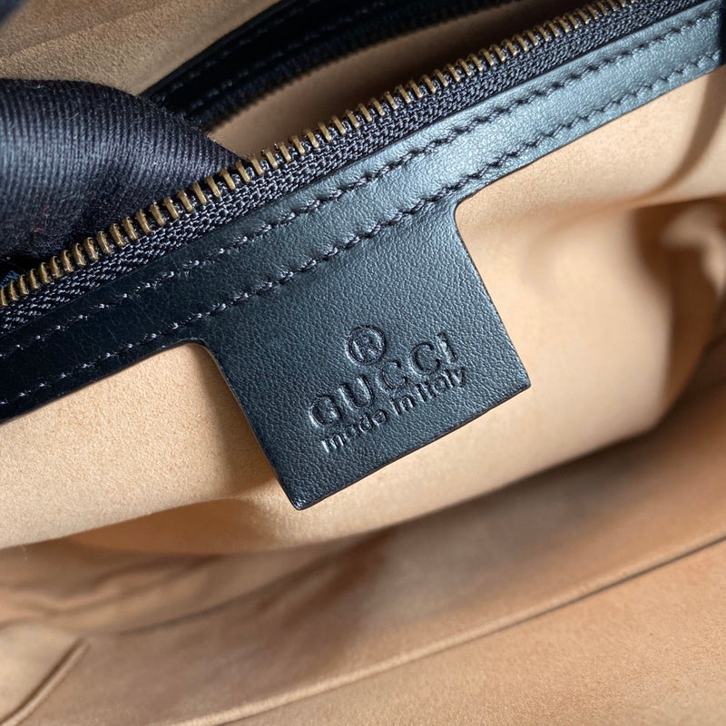 Close-up detail of refined structured women's handbag – women's luxury handbag