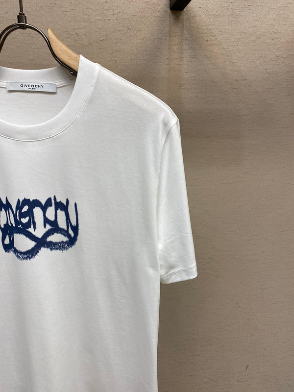 Flat lay presentation of Givenchy luxury clothing with contemporary cut