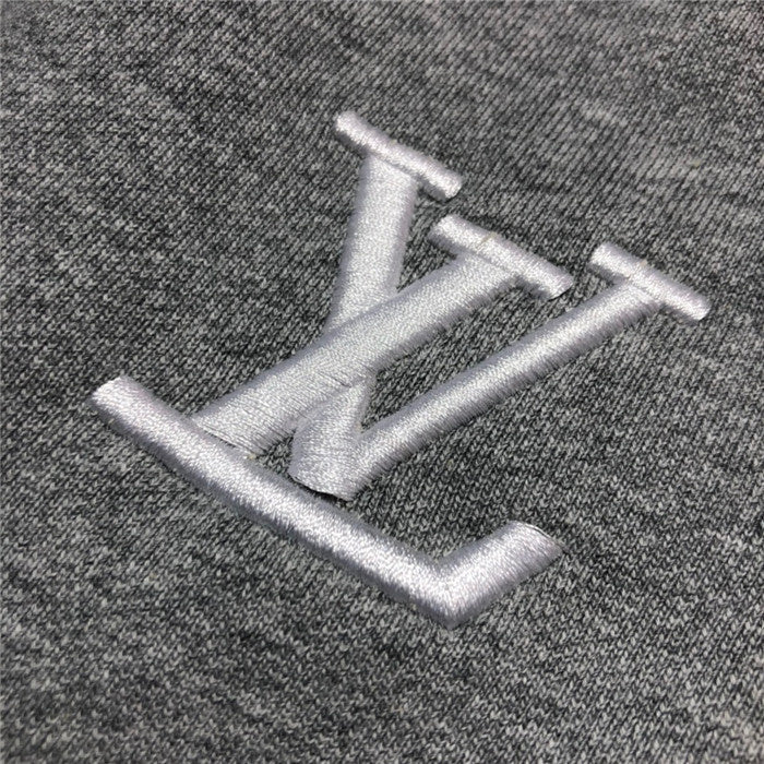 Flat lay presentation of Louis Vuitton cotton t-shirt with label-forward styling