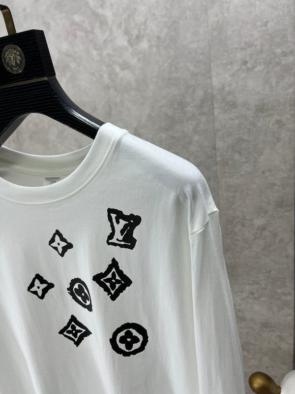 Full styled look of Louis Vuitton luxury clothing with monogram-inspired silhouette