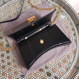 Front view of signature elevated women's handbag – women's designer-style accessory