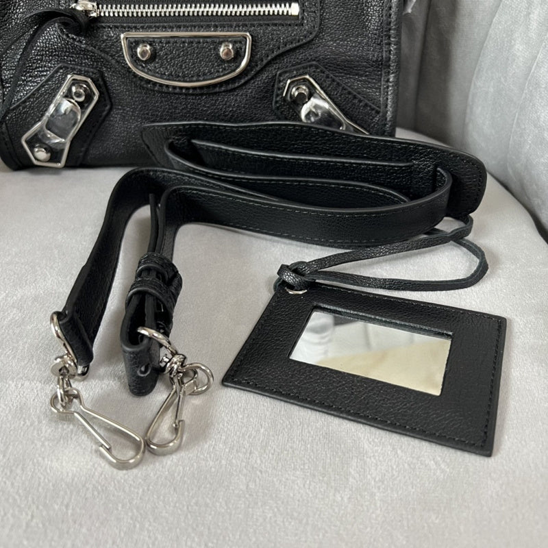 Zivas Charm Understated Luxury Statement Handbag (Signature Shape & Finish) – Side Profile