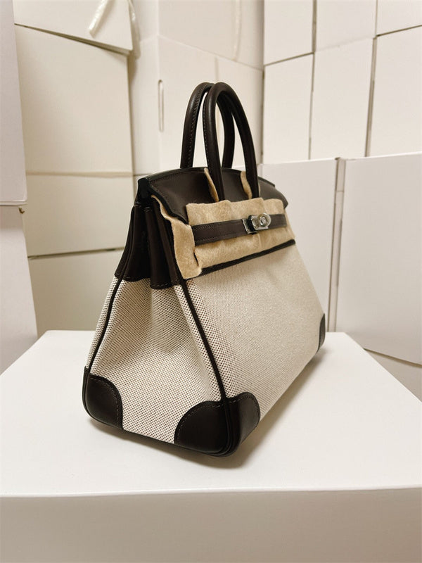  Structured carryall bag carried on shoulder