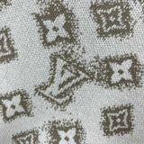 Flat lay presentation of Louis Vuitton luxury clothing with logo-detail design