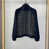 Front view of Louis Vuitton luxury clothing with label-forward styling