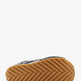 Close-up of Bottega Veneta athletic hardware and fine stitching