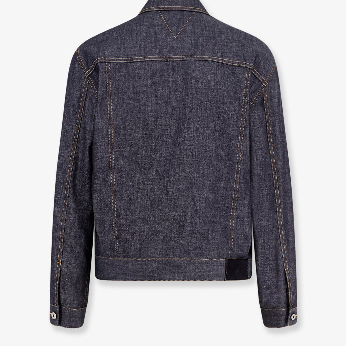 Close-up of Bottega Veneta jackets hardware and fine stitching