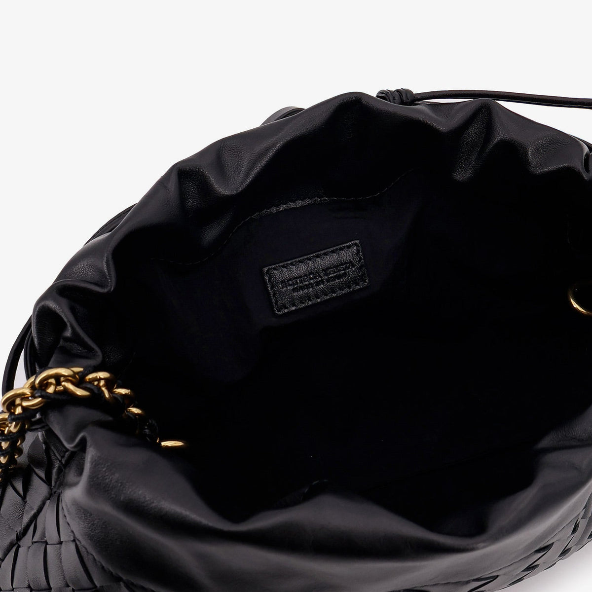 Bottega Veneta pochettes lifestyle shot premium designer piece