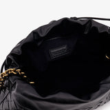Bottega Veneta pochettes lifestyle shot premium designer piece