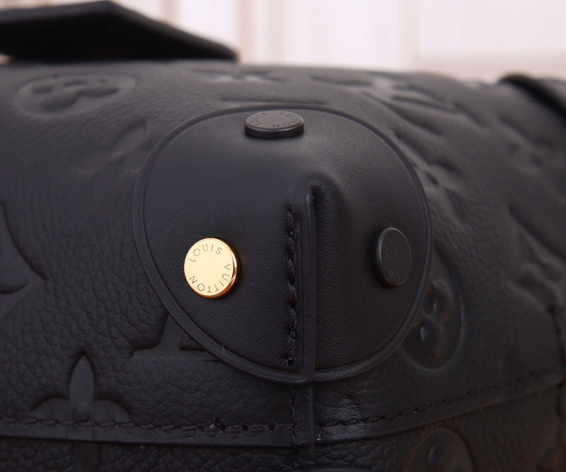Handle and strap detail of statement elevated women's handbag – women's designer-style accessory