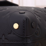 Handle and strap detail of statement elevated women's handbag – women's designer-style accessory