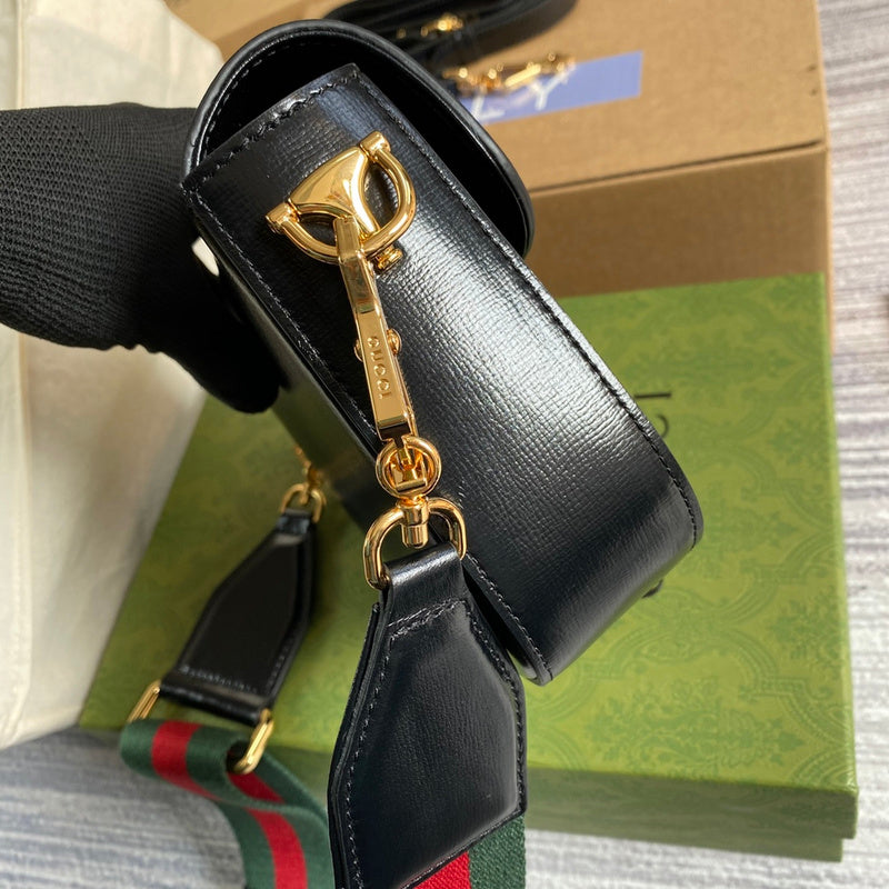 Front view of structured signature women's handbag – women's luxury accessory
