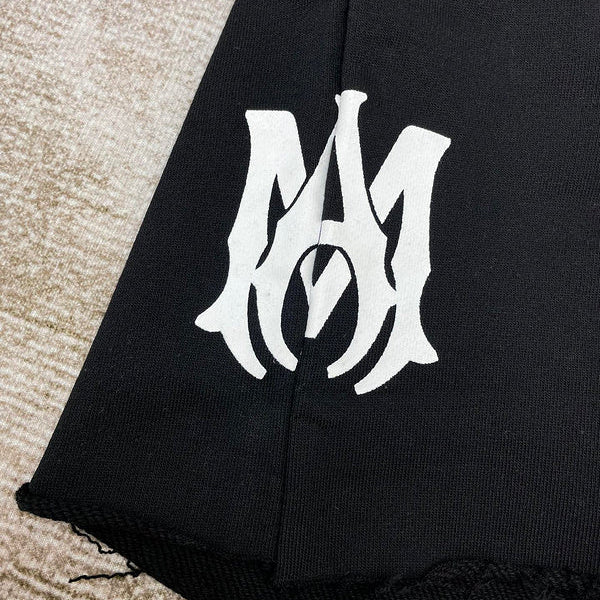Three-quarter angle view of Amiri luxury piece style No.074