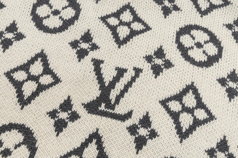 Flat lay presentation of Louis Vuitton luxury clothing with contemporary cut