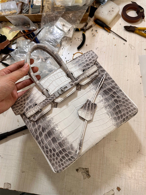 structured crossbody bag detail view showing craftsmanship 14