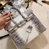  structured crossbody bag detail view showing craftsmanship 14