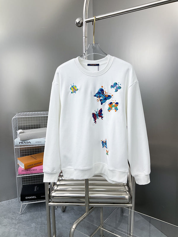 Back view of Louis Vuitton luxury clothing with label-forward styling