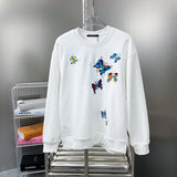 Back view of Louis Vuitton luxury clothing with label-forward styling