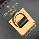 Styled lifestyle shot of polished everyday-luxe women's handbag – women's statement bag