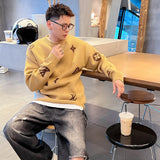 Full styled look of Louis Vuitton luxury clothing with signature branding