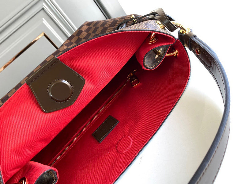 Front view of signature sleek women's handbag – women's luxury handbag