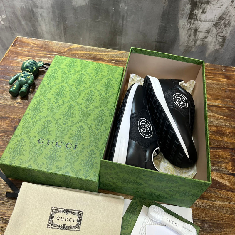 Gucci tonal black luxury sneakers view 5 bold athletic profile