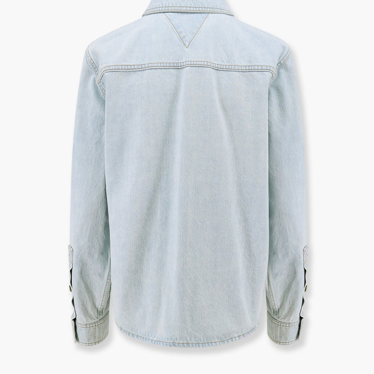 Close-up of Bottega Veneta blouses hardware and fine stitching